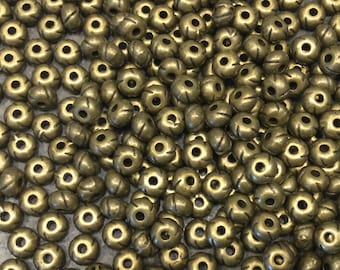 CLEARANCE Bronze finish Bali style 5.5mm spacer beads Package of 10 beads Tibetan bronze patterned beads
