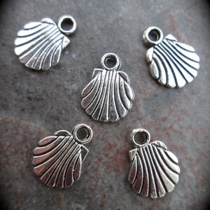Small Sea Shell charms in antique silver finish Package of 5 charms Beach theme charms great for adjustable bangle bracelets