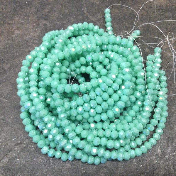 Medium Mint Green Frost faceted crystal rondelle beads with AB finish 6mm 17 inch strand