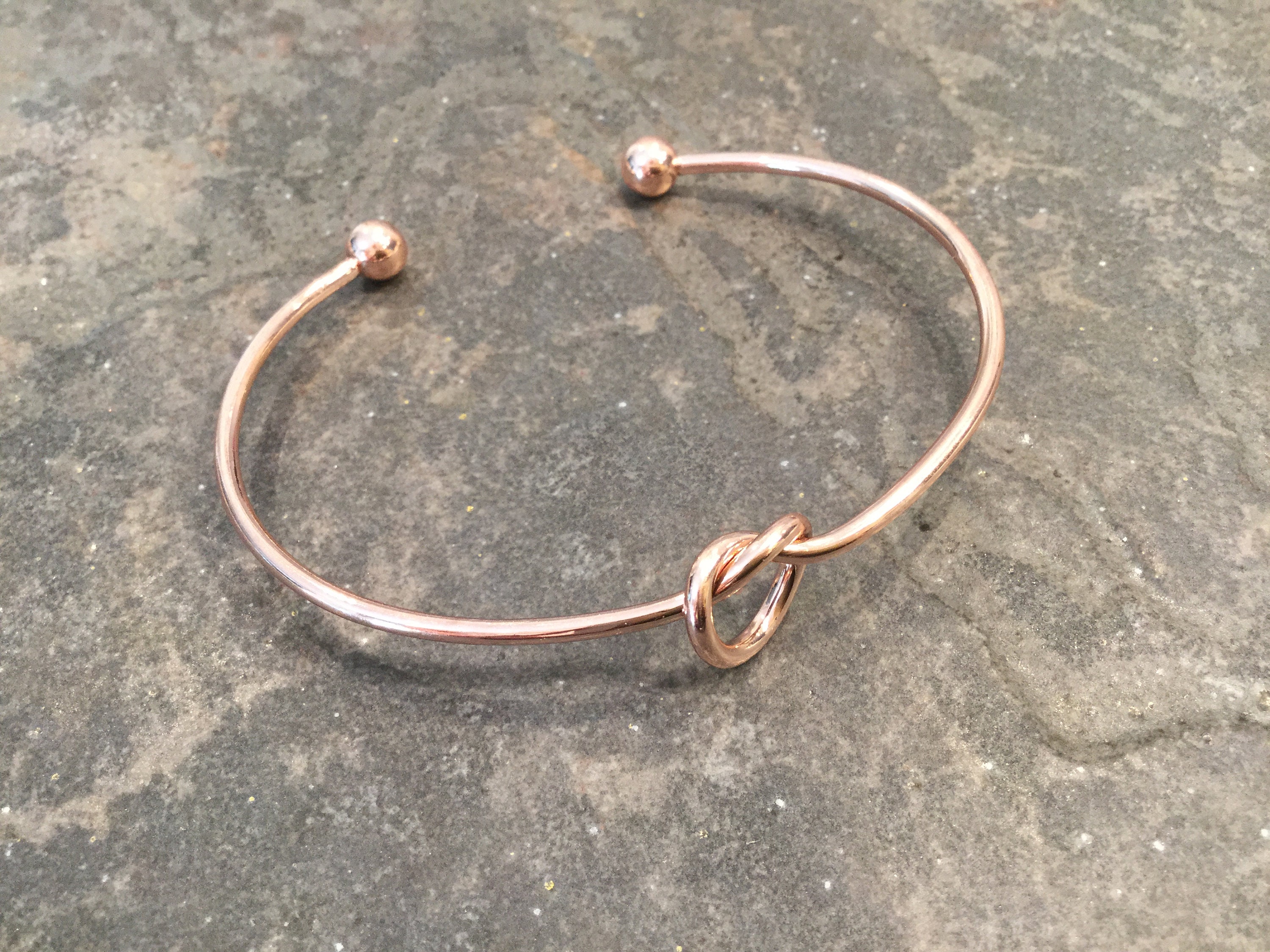 Love Knot Bangle Bracelet in Rose Gold Finish With Ball Ends