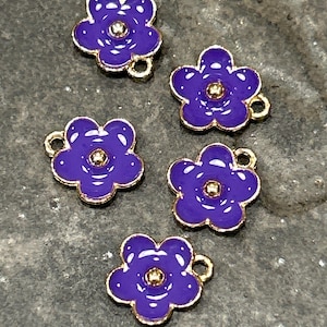 Daisy flower charms in gold finish with purple enamel detail package of 5 charms great for Easter and Spring Jewelry projects