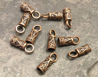 Ornate cord ends with loop in antique copper finish Fits up to 4mm cord Pack of 10 cord end caps with loop