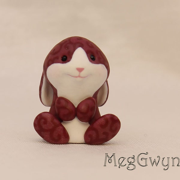 Cute Miniature Bunny Rabbit Figurine, with a swirl pattern in burgundy or dark magenta.  Hand painted & hand sculpted OOAK