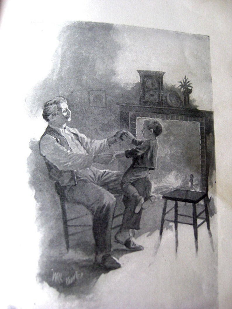 May include: Black and white illustration of a man seated in a chair, holding the hands of a child standing on his lap. A small stool is to the right. A fireplace and clock are in the background.