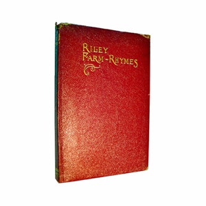May include: A vintage book titled "Riley Farm-Rhymes" with a textured red cover and gold lettering. The book's spine is dark green with gold accents. The book is set against a white background.
