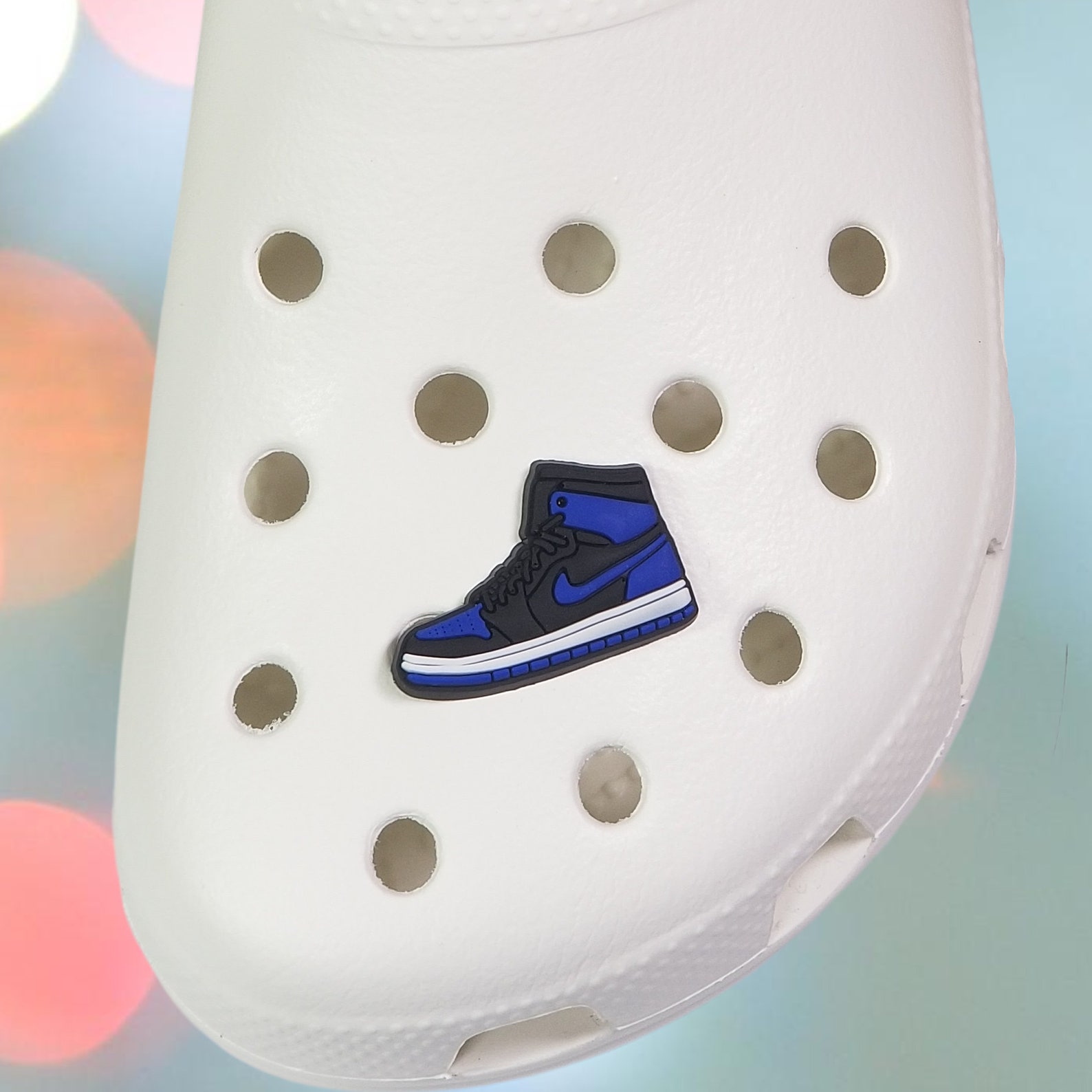 blue crocs with charms