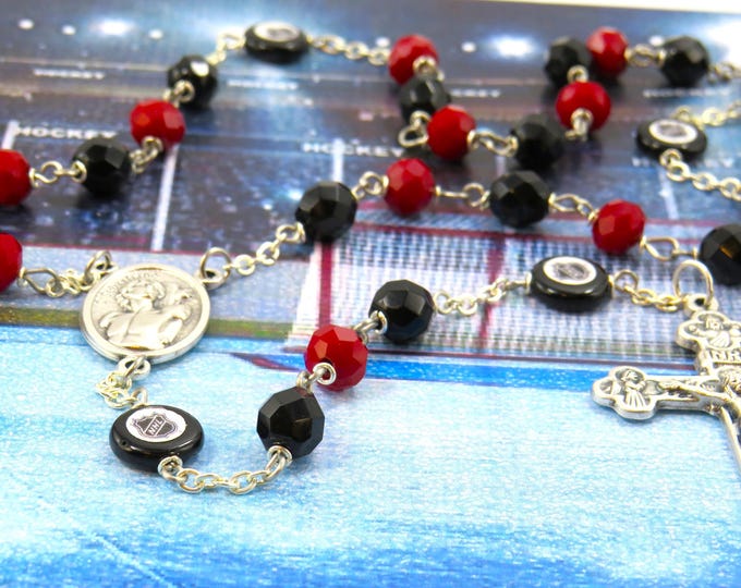 Hockey Rosary - Czech 8mm Deep Red and Black Glass Beads - Czech Glass Hockey Pucks - Italian Silver St Sebastian Center - Italian Crucifix
