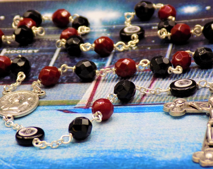 Hockey Rosary - Czech 8mm Deep Red and Black Glass Beads - Czech Glass Hockey Pucks - Italian Silver St Sebastian Center - Italian Crucifix