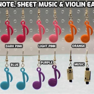 May include: A set of colorful music note earrings. The earrings are available in red, dark pink, light pink, orange, yellow, green, blue, purple, sheet music, and violin designs.