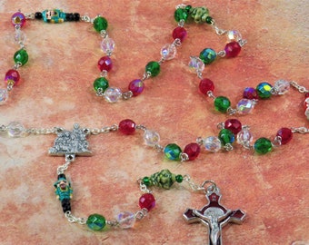 Christmas Rosary - Czech AB Green, Red & Clear Crystal Beads - Peru Ceramic Father Beads - Holy Family Nativity Center - Red Enamel Crucifix