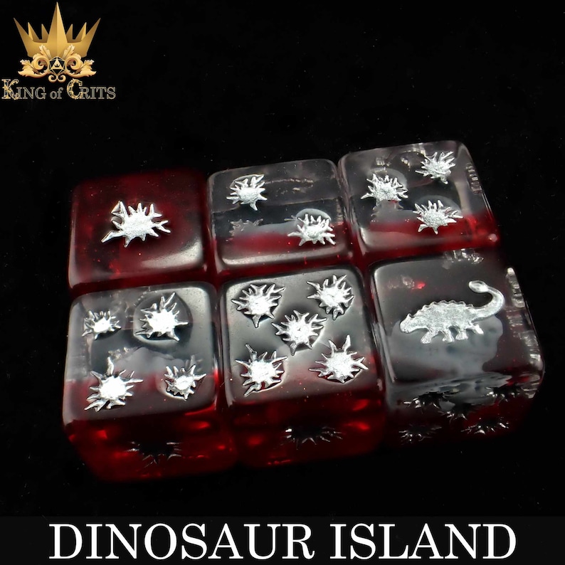 May include: Set of six red dice with silver dinosaur and star designs. The dice are arranged in a rectangular shape. The dice are labeled "Dinosaur Island".