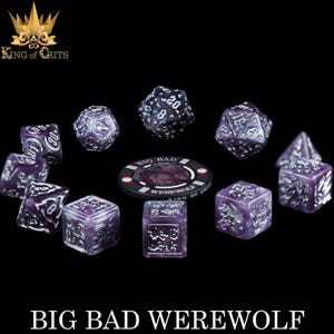 May include: A collection of purple and silver dice with various shapes and sizes, including a 20-sided die. A poker chip with a werewolf graphic is also present. The text "BIG BAD WEREWOLF" is at the bottom.