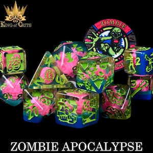 May include: A set of eight translucent dice with pink and green brains and a zombie graphic. The dice are on a black background with a green and yellow patch that says "Zombie".