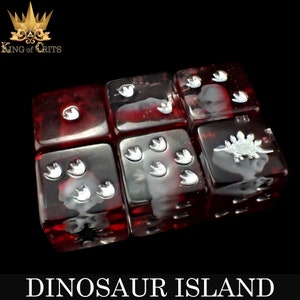 May include: A set of six red dice with white dinosaur footprints and a dinosaur silhouette. The dice are translucent and have a speckled appearance.