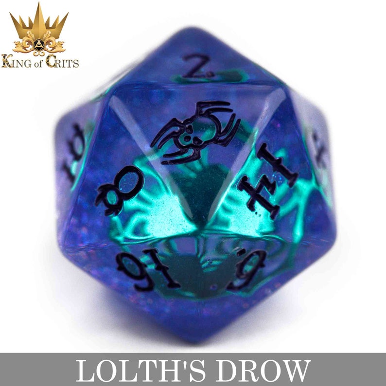 May include: A blue and green iridescent d20 dice with a spider graphic and the numbers 1 through 20. The dice is translucent and shows the numbers through the plastic.