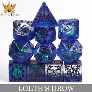 May include: A set of 10 blue and green dice with a spider web design and glitter. The dice are arranged in a pyramid shape. The dice are labeled with numbers 1 through 10. The dice are made of clear plastic with a blue and green glitter effect. The dice are labeled with the text "Lolth's Drow".