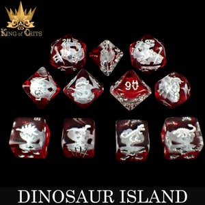 May include: Set of ten red and clear dice with white dinosaur illustrations. The dice are numbered 1-6 and 9-12. The dice are labeled "Dinosaur Island".