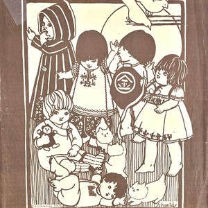 May include: A brown vintage pattern book titled "Folkwear 109" with illustrations of children in folk clothing. The cover features the text "Little Folks" and mentions patterns for infants and toddlers from various countries.