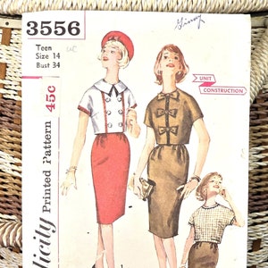 May include: Vintage Simplicity sewing pattern number 3556 for a teen size 14 dress with a bust measurement of 34 inches. The pattern is printed on white paper with a brown and white wicker basket in the background. The pattern includes instructions for unit construction and is labeled "Simple to make".