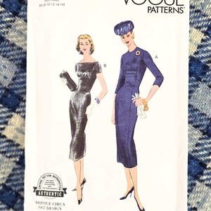 May include: A vintage Vogue Patterns sewing pattern for two dresses, dating from 1957. The pattern includes illustrations of the dresses, size details, and the Vogue Patterns logo. It is a reissue, designed and printed in the USA. The pattern is labelled V1979.