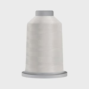 May include: A white spool of thread for sewing or embroidery.