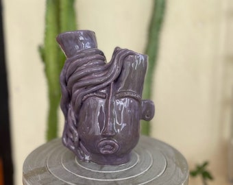 One-of-a-kind ceramic face sculpture and vase