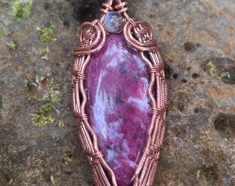 Wire wrapped ruby in schists