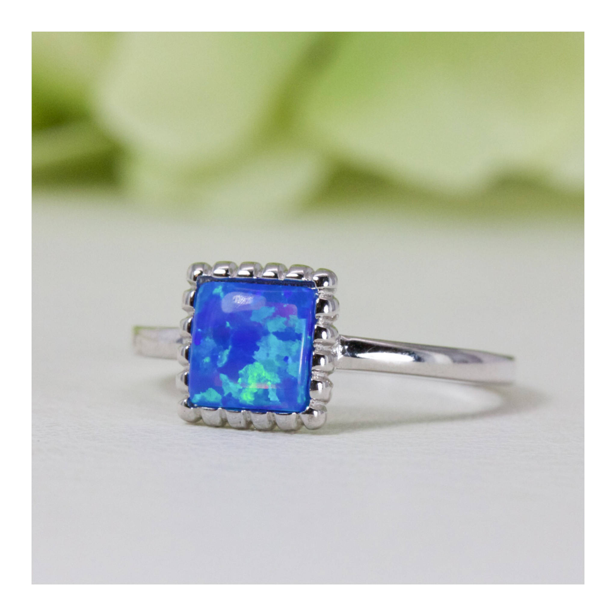 Clearance — LabCreated Blue Opal Solitaire Ring In Sterling Silver