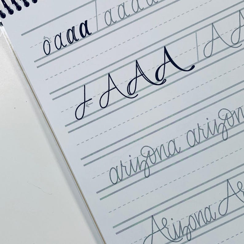 Make beautiful handwriting a part of your creative life with this lettering guide! It's perfect for beginners or intermediate creatives looking to learn lettering with a handwritten flair. Find this Etsy Bestseller at herhazeleyes.com