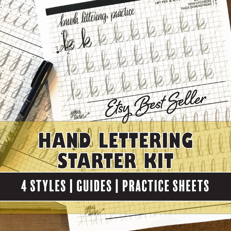 Brush lettering workbook open to practice page for beginners