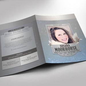 以下が含まれることがあります： 女性が笑顔で写っている白とグレーの葬儀プログラム。プログラムには「SUSANA MOORHOUSE」という名前と「Sept 7, 1960 - Dec 12, 2018」という日付が記載されています。