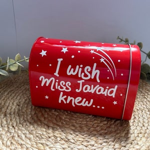 May include: Red metal mailbox with white stars and the text "I wish Miss Javaid knew..."