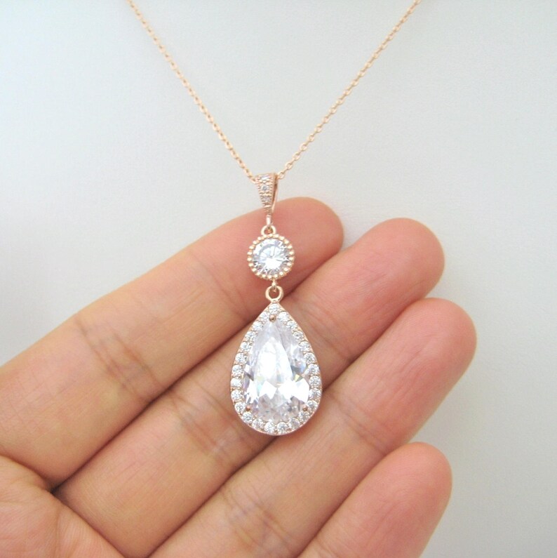 8mm x 22mm Jewel Tie Sterling Silver Blue CZ Cubic Zirconia Pendant 8mm x 22mm Jewel Tie Sterling Silver Blue CZ Cubic Zirconia Pendant