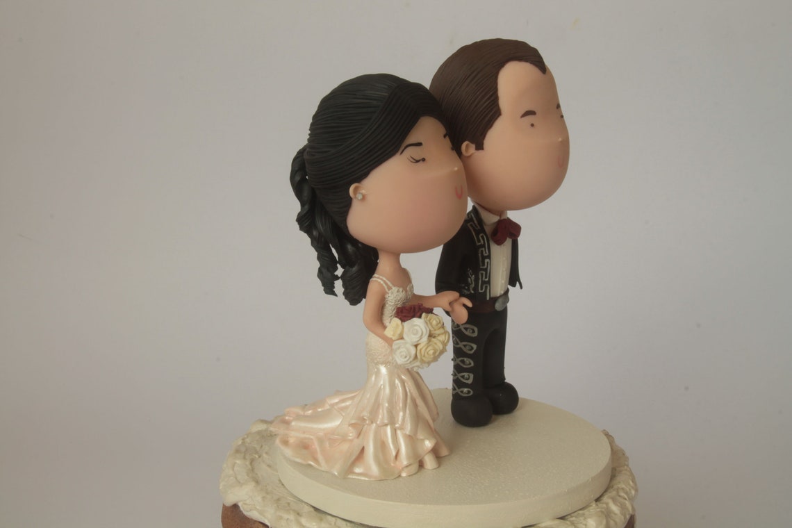 Mexican wedding cake topper. Holding hands. Wedding figurine. Etsy