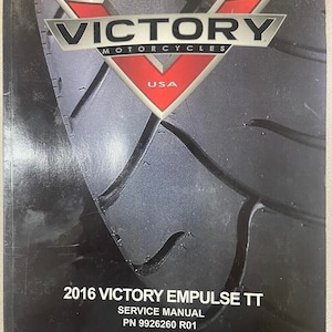 May include: A black and red service manual for a 2016 Victory Empulse TT motorcycle. The cover features a tire tread pattern and the Victory Motorcycles logo with "USA" printed below it. The text "2016 VICTORY EMPULSE TT SERVICE MANUAL PN 9926260 R01" is printed in white at the bottom of the cover.