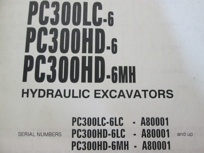 May include: Black and white text on a white background. The text reads "PC300LC-6, PC300HD-6, PC300HD-6MH, HYDRAULIC EXCAVATORS, SERIAL NUMBERS, PC300LC-6LC - A80001, PC300HD-6LC - A80001 and up, PC300HD-6MH - A80001".