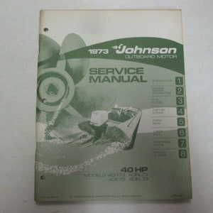May include: A 1973 Johnson 40 HP outboard motor service manual. The cover features a green and white illustration of a boat with a propeller and the text "1973 Johnson Outboard Motor Service Manual". The manual includes instructions for general information, fuel system, ignition system, power head, lower unit, electrical system, and manual starter.