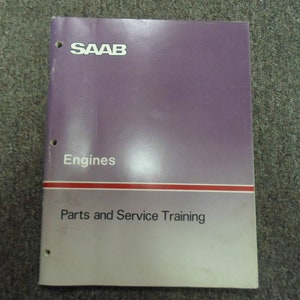 Könnte beinhalten: Ein lila-weißes SAAB-Handbuch mit dem Titel "Engines" und "Parts and Service Training" darunter. Das Handbuch hat drei Lochungen auf der linken Seite. Das SAAB-Logo befindet sich oben.