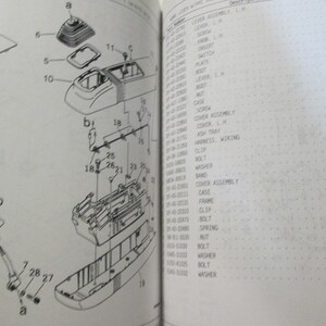 May include: A black and white diagram showing the parts of a car's gear shift assembly. The diagram includes numbers and letters to identify each part. The parts are labeled with their names, such as "lever assembly", "screw", "switch", "plate", "lever", "case", "screw", "cover assembly", "ashtray", "harness, wiring", "clip", "washer", "band", "cover assembly", "cage", "frame", "clip", "bolt", "spring", "nut", "bolt", "washer", "bolt", "washer".