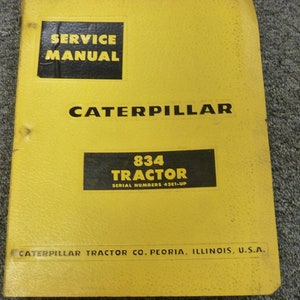 May include: Yellow service manual cover for a Caterpillar 834 Tractor. The cover has black text and a black border. The text on the cover reads "Service Manual", "Caterpillar", "834 Tractor", "Serial Numbers 4361-Up", and "Caterpillar Tractor Co. Peoria, Illinois, U.S.A."