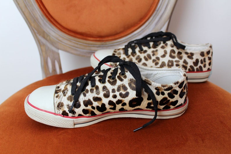 white trainers with animal print
