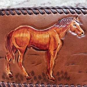 Cartera hecha a mano con caballos