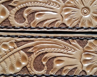 Hand carved and tooled western floral belt