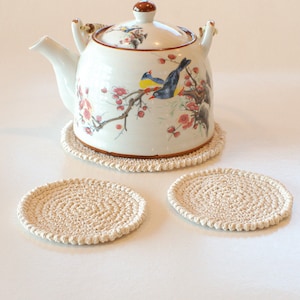 Set of hand crocheted cotton coasters Set of cream coasters and a teapot pad image 1