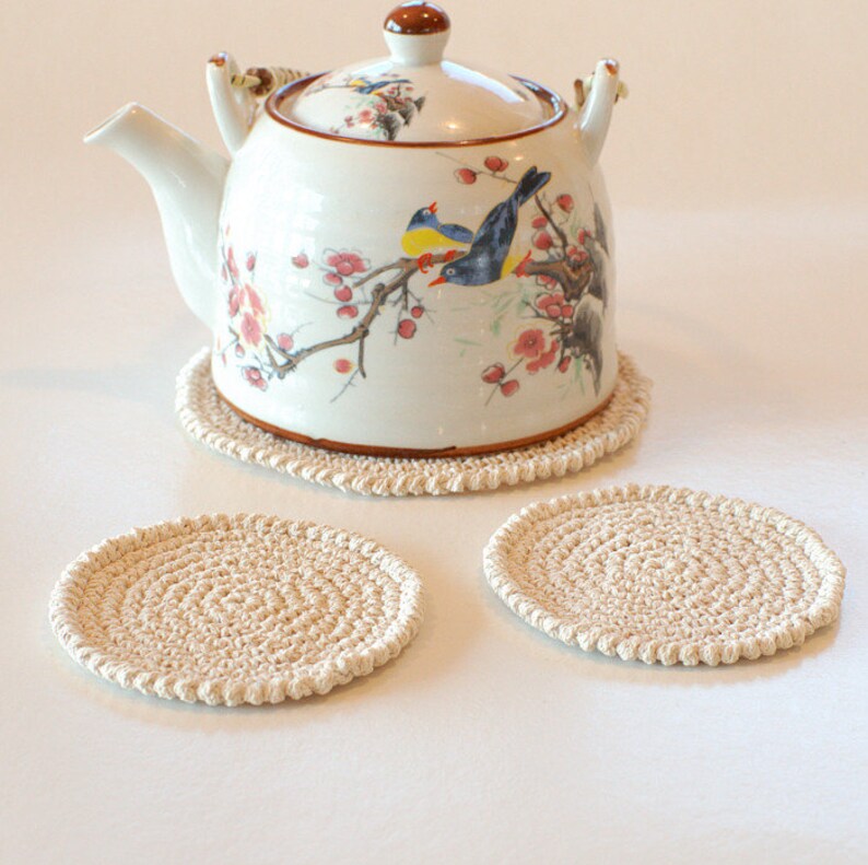 Set of hand crocheted cotton coasters Set of cream coasters and a teapot pad image 1