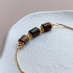 Adjustable bracelet with golden-brown Tiger’s Eye beads