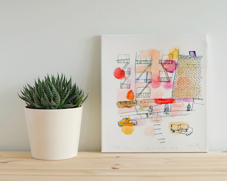 Minimalist living room with an A3 New York fine art building sketch print.