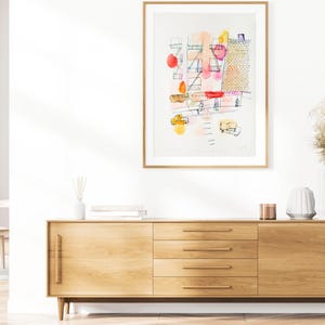 Minimalist living room with an A3 New York fine art building sketch print.