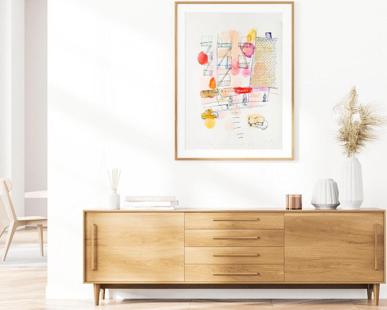 Minimalist living room with an A3 New York fine art building sketch print.