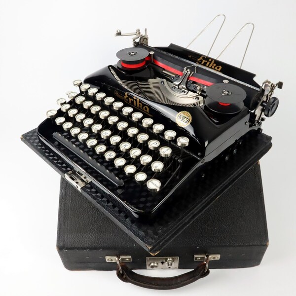 Erika Model 5 Typewriter by Seidel & Naumann Dresden, Glossy Black, Built 1932, With Instruction Manual - Very Nice Condition